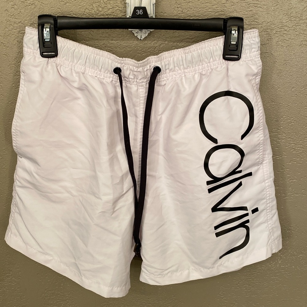 Calvin Klein white swim trunks